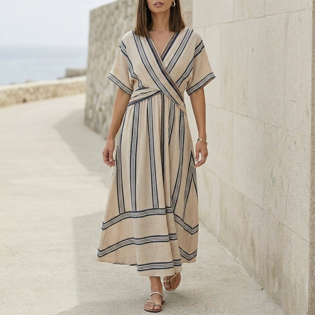 Elegant Pleated Flared Maxi Dress with Wrap-Style V-Neck and Textured Trim