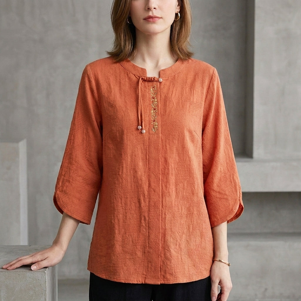 Bohemian Embroidered Blouse with Relaxed Fit and Tassel Tie Detail