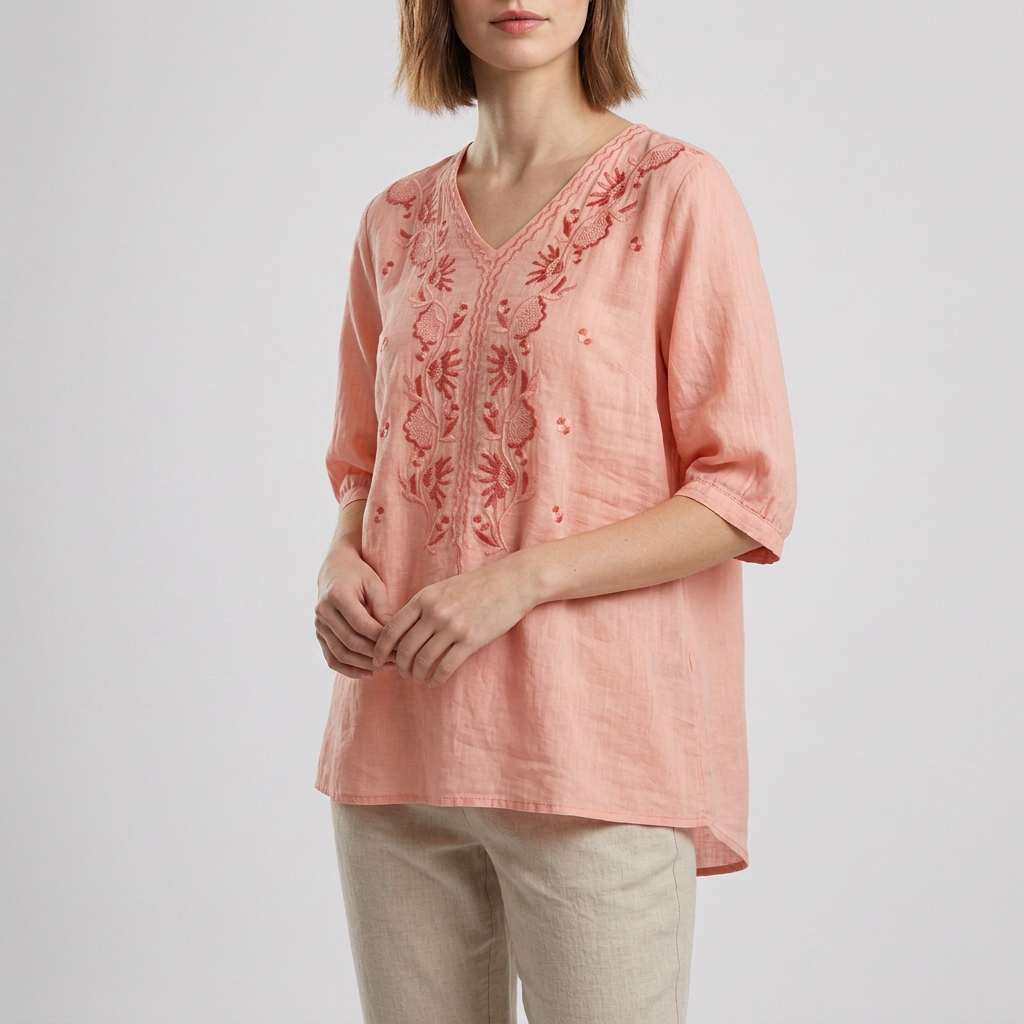Relaxed V-Neck Blouse with Embroidered Floral Accents and High-Low Hem