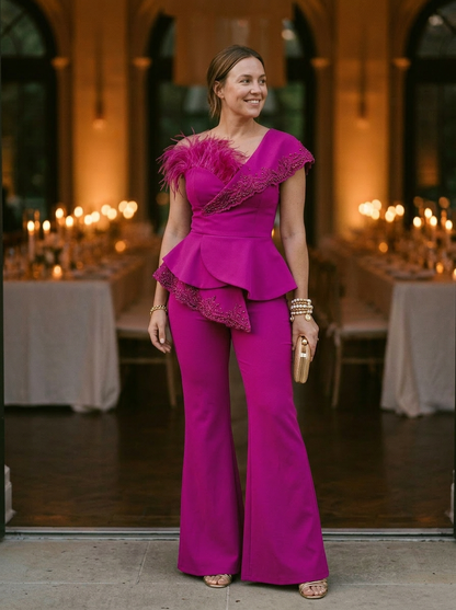 Elegantly Embellished Strapless Jumpsuit with Peplum Waist and Feather Detail