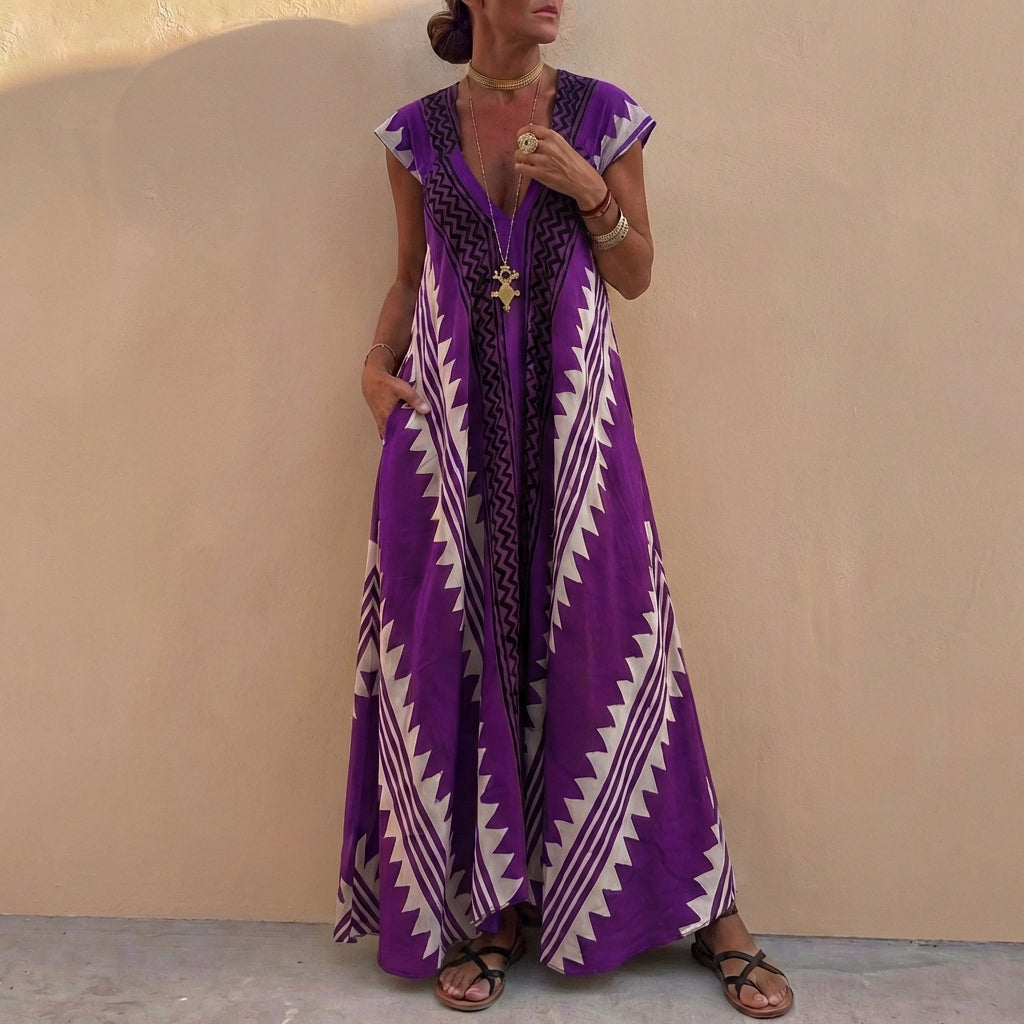 Bohemian-Inspired Flowing A-Line Maxi Dress with Deep V-Neck and Geometric Motifs