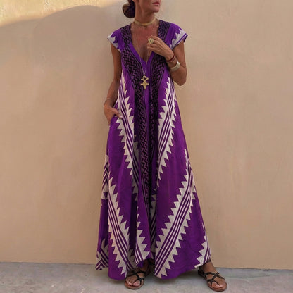 Bohemian-Inspired Flowing A-Line Maxi Dress with Deep V-Neck and Geometric Motifs