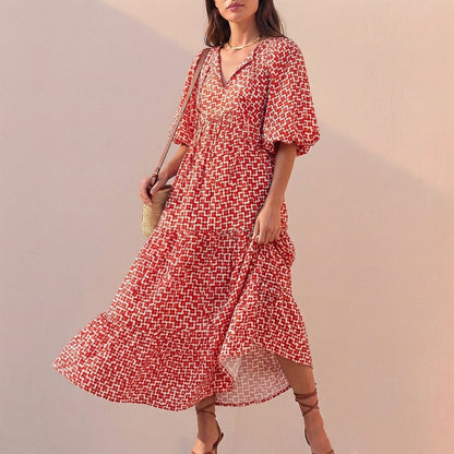 Elegant Flowing V-Neck Midi Dress with Puff Sleeves and Tiered Skirt