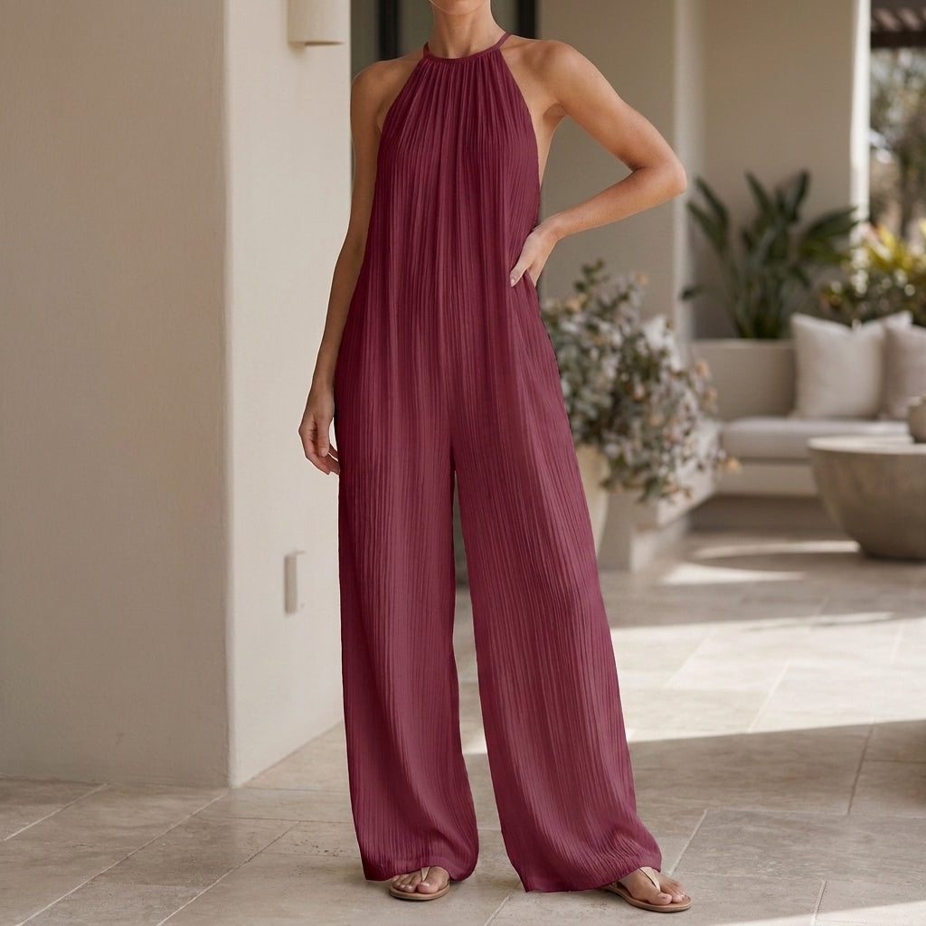 Pleated Halter Jumpsuit with Flowing Wide Leg Silhouette