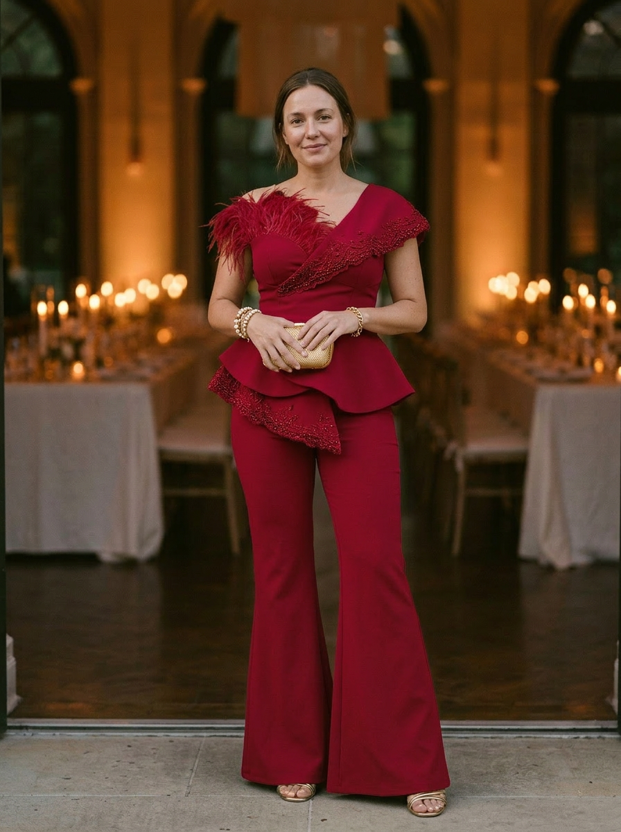 Elegantly Embellished Strapless Jumpsuit with Peplum Waist and Feather Detail