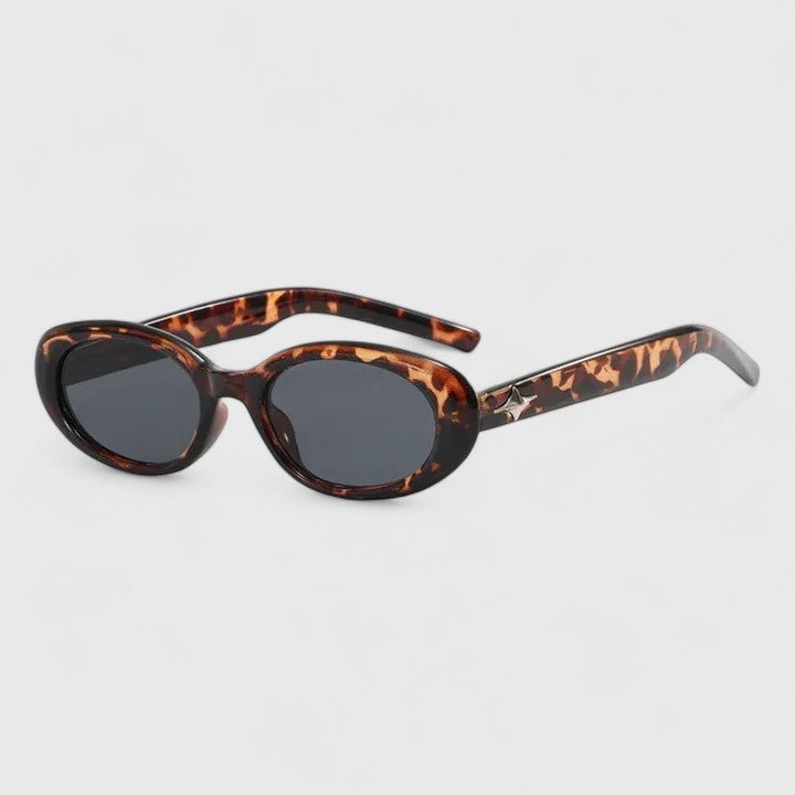 Daniela Narrow Oval Sunglasses with Star-Embellished Temples
