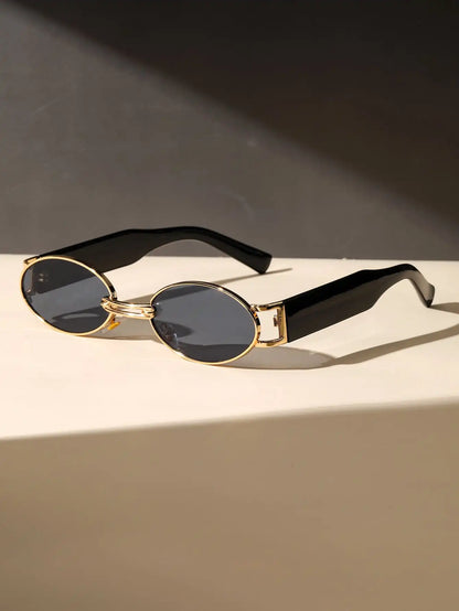Retro-Inspired Oval Frame Sunglasses with Sculpted Metallic Accents