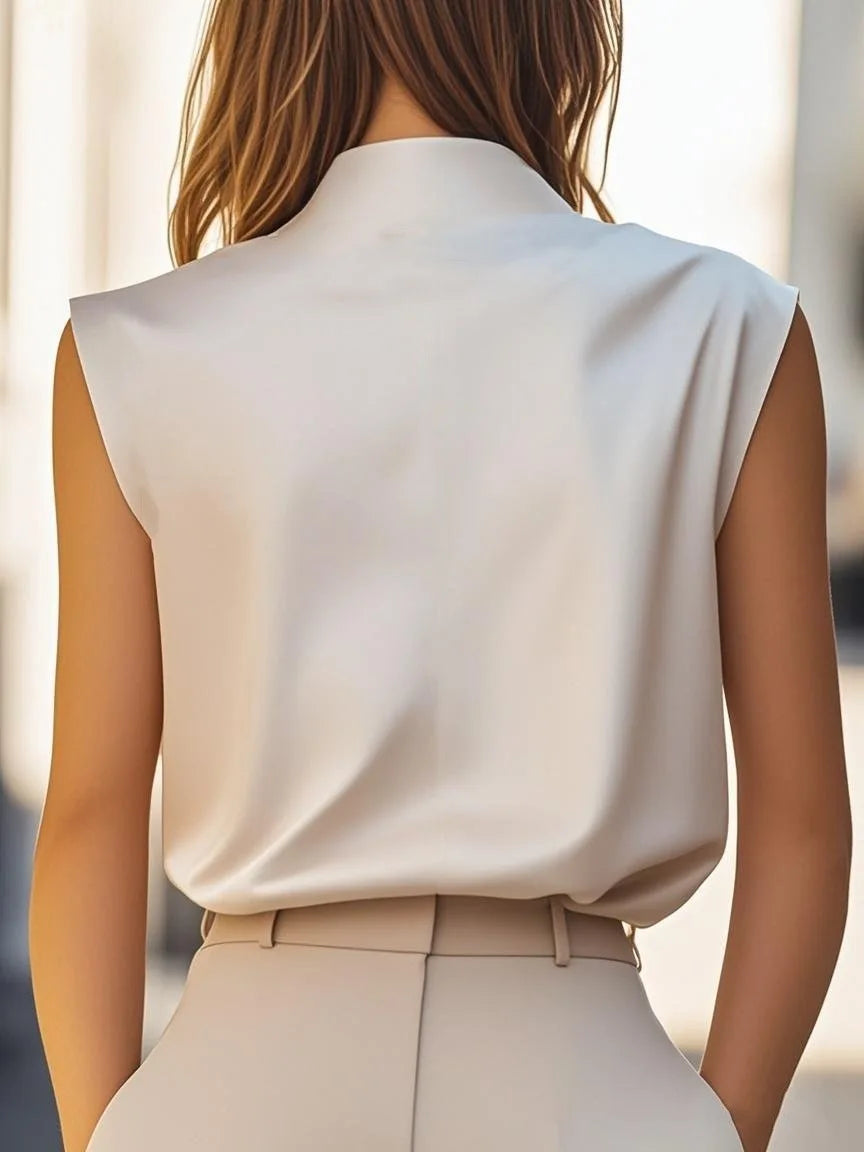 Luxurious Satin Sleeveless Blouse with Mock Neck and Shoulder Buttons