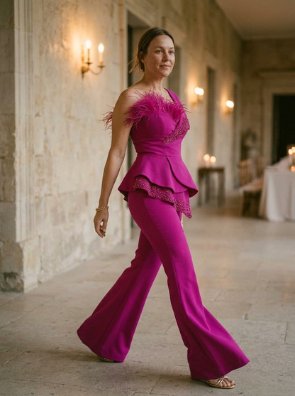 Elegantly Embellished Strapless Jumpsuit with Peplum Waist and Feather Detail