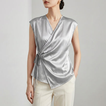 Tailored Sleeveless Wrap Blouse with Pleated Draping and Side Tie Closure