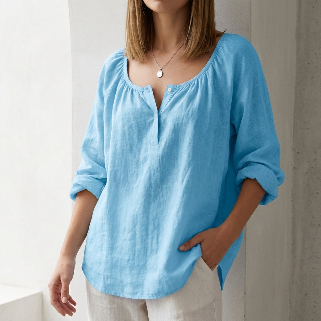Relaxed Scoop Neck Pullover Blouse with Curved Hem and Button Accents