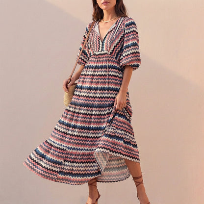 Elegant Flowing V-Neck Midi Dress with Puff Sleeves and Tiered Skirt