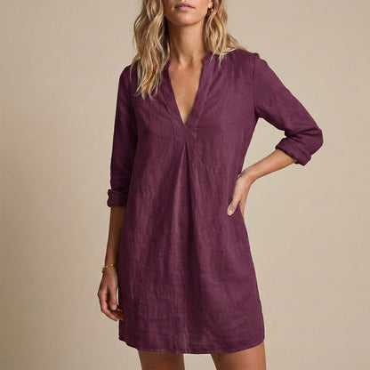 Relaxed V-Neck Tunic Mini Dress with Subtle Pleat and Raw-Edge Hem