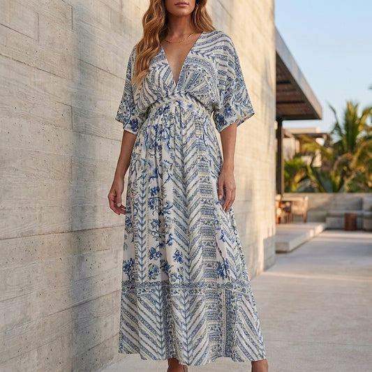 Flowing Printed V-Neck Maxi Dress with Flutter Sleeves and Slit