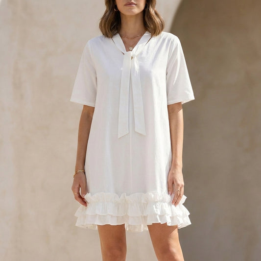 Relaxed Ruffle Hem Mini Dress with Elegant Tie Neck Detail