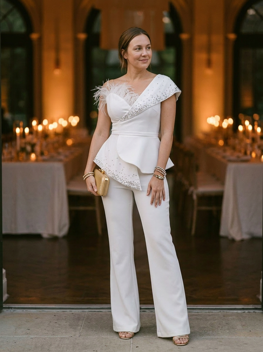 Elegantly Embellished Strapless Jumpsuit with Peplum Waist and Feather Detail