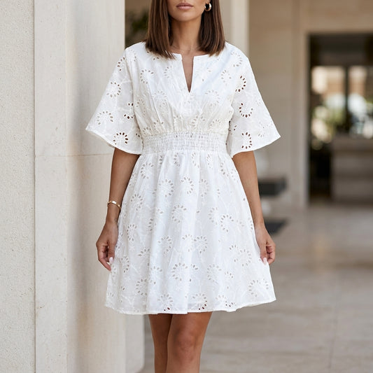 Elegant Eyelet Mini Dress with Smocked Waist and Feminine Silhouette