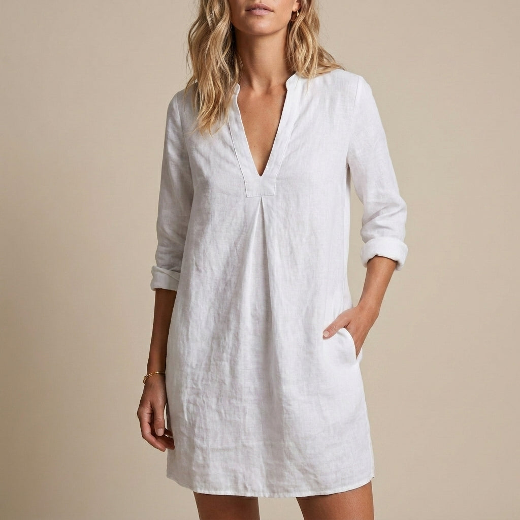 Relaxed V-Neck Tunic Mini Dress with Subtle Pleat and Raw-Edge Hem