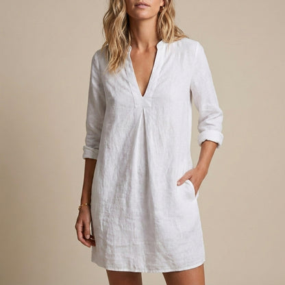Relaxed V-Neck Tunic Mini Dress with Subtle Pleat and Raw-Edge Hem