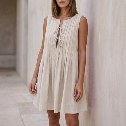 Sleeveless A-Line Mini Dress with Pin-Tuck Bodice and Tie-Neck Detail
