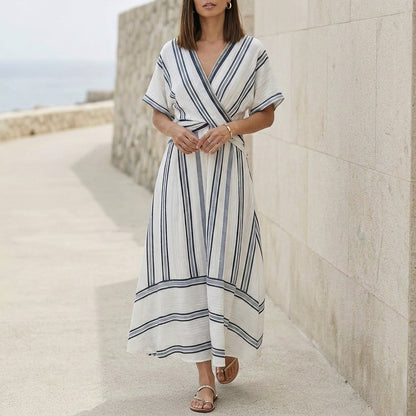 Elegant Pleated Flared Maxi Dress with Wrap-Style V-Neck and Textured Trim