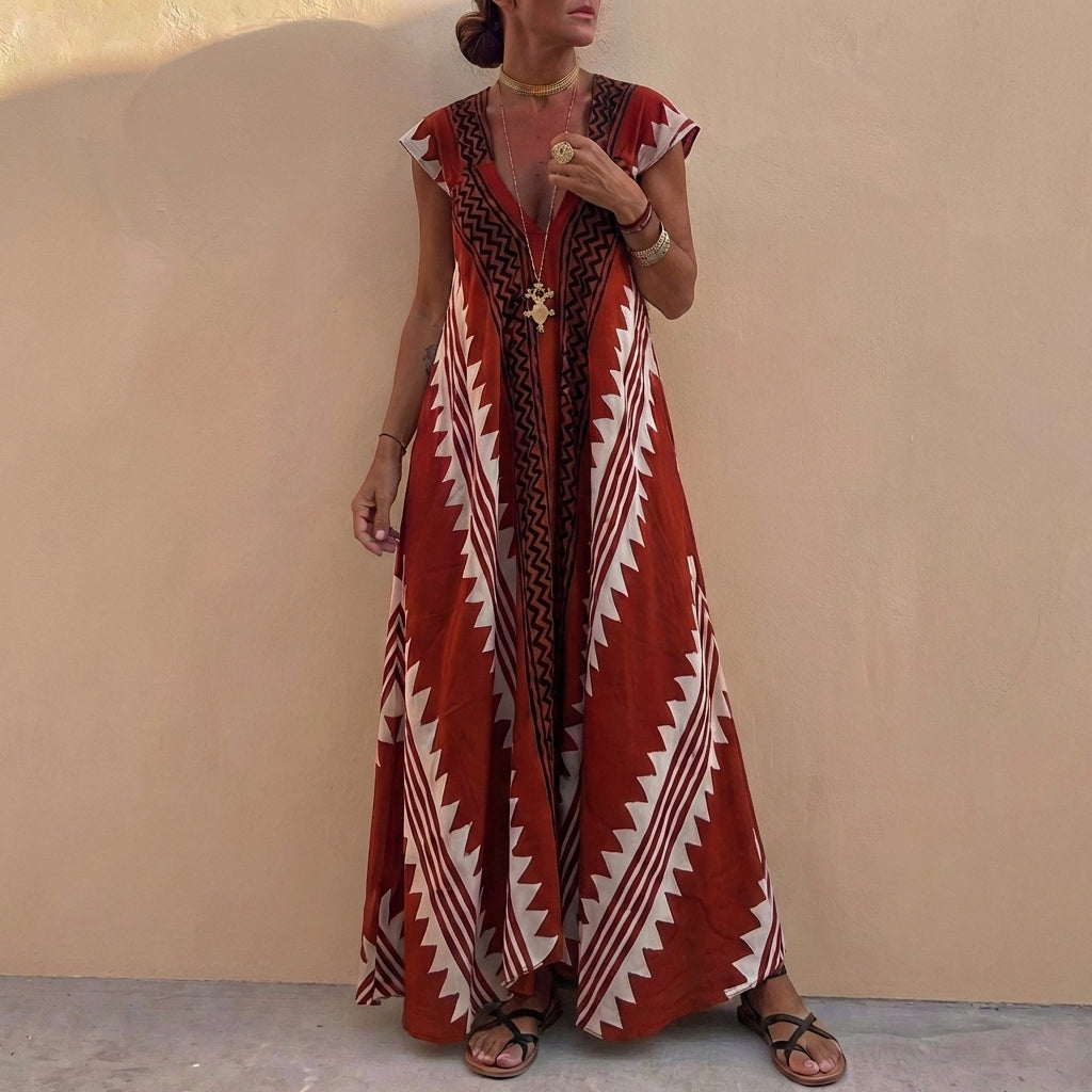 Bohemian-Inspired Flowing A-Line Maxi Dress with Deep V-Neck and Geometric Motifs