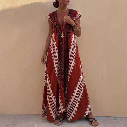 Bohemian-Inspired Flowing A-Line Maxi Dress with Deep V-Neck and Geometric Motifs