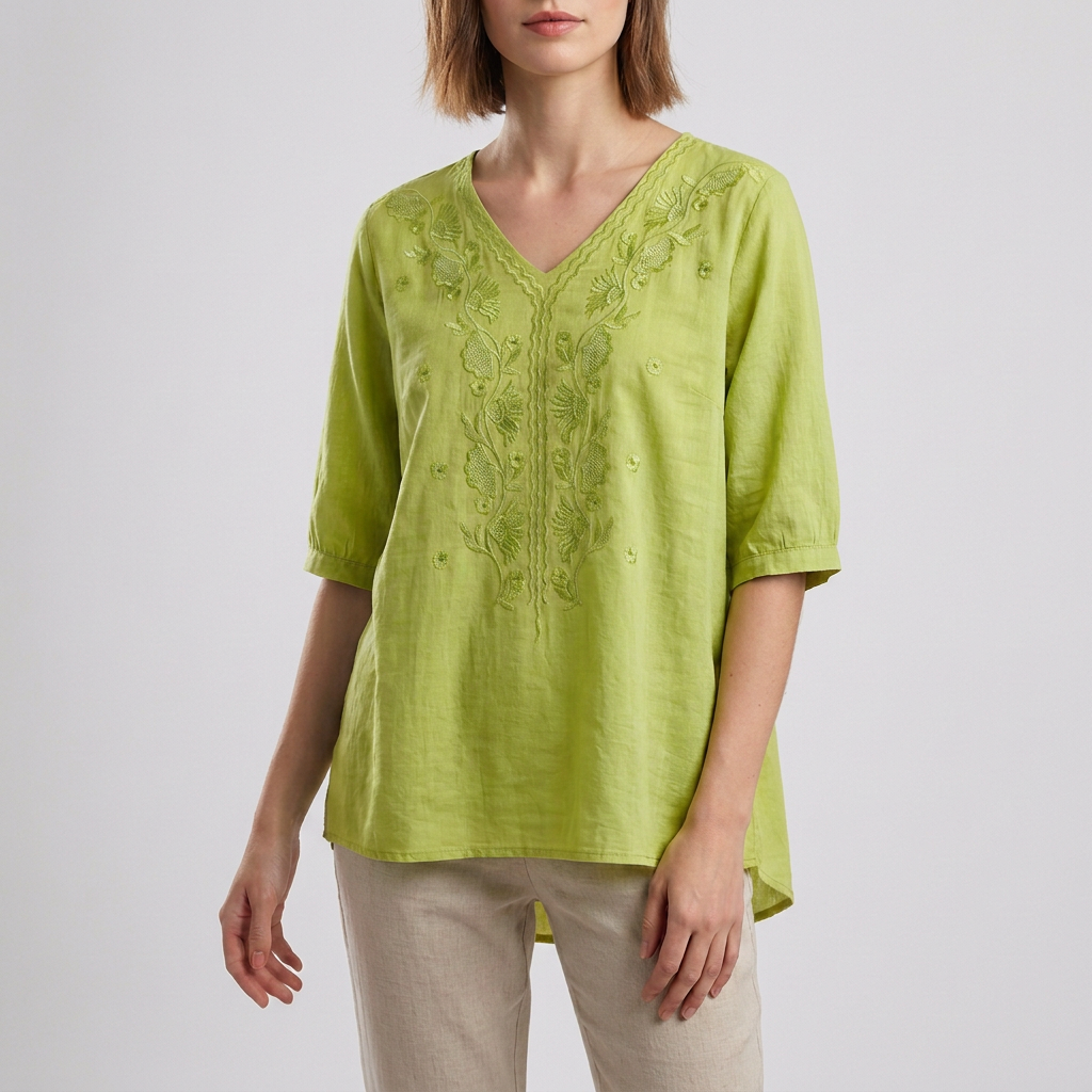 Relaxed V-Neck Blouse with Embroidered Floral Accents and High-Low Hem