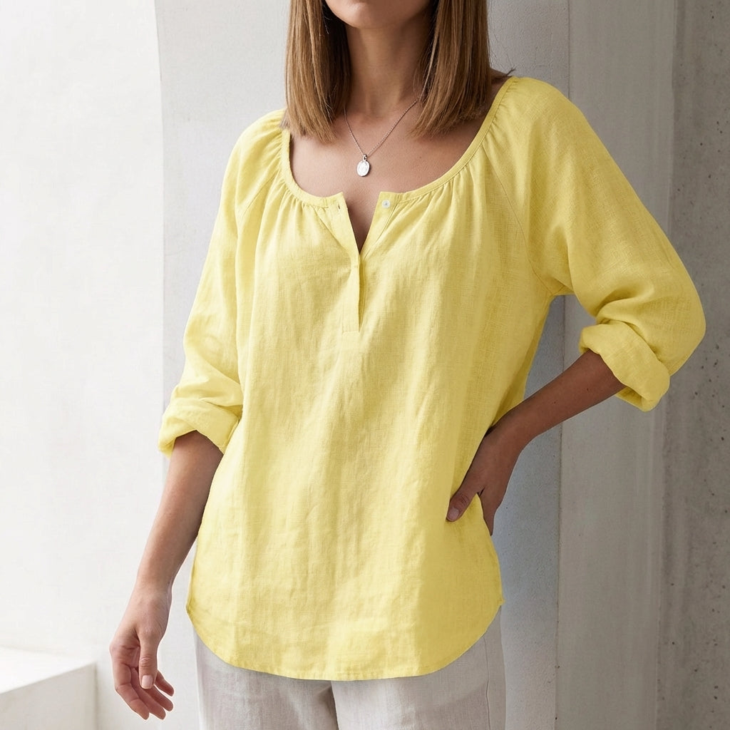 Relaxed Scoop Neck Pullover Blouse with Curved Hem and Button Accents