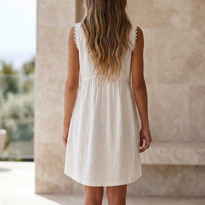 Flowing Sleeveless Mini Dress with Lace-Trimmed V-Neck and Patch Pockets
