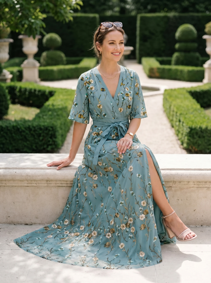 Elegant Floral Print V-Neck Maxi Dress with Flutter Sleeves and Pockets