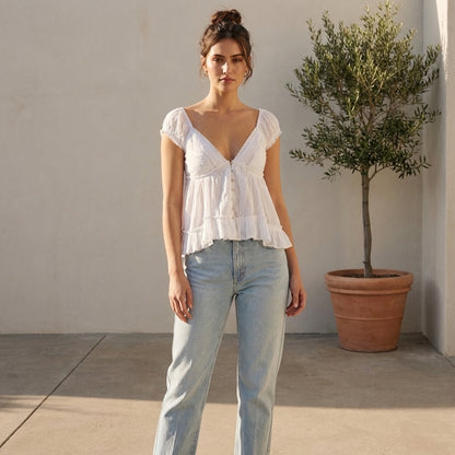 Elegant Peplum Blouse with Embroidered Eyelet and Ruffled Sleeves
